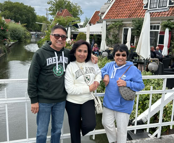 Maaike your local tourguide  wearing Dutch wooden shoes. Windmill, Tulips, Cheese, Zaanse Schans, Keukenhof, Volendam, Marken, Alkmaar.