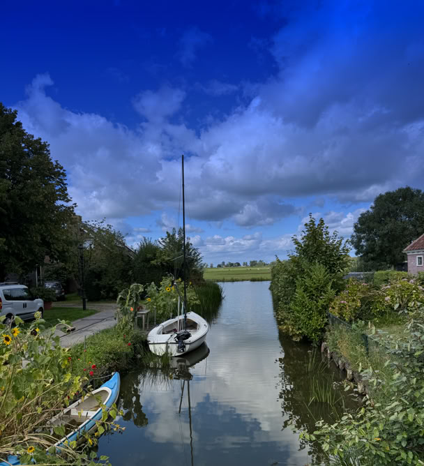 Maaike your local tourguide  wearing Dutch wooden shoes. Windmill, Tulips, Cheese, Zaanse Schans, Keukenhof, Volendam, Marken, Alkmaar.