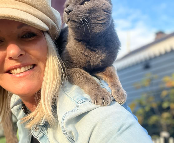 Maaike your local tourguide  wearing Dutch wooden shoes. Windmill, Tulips, Cheese, Zaanse Schans, Keukenhof, Volendam, Marken, Alkmaar.