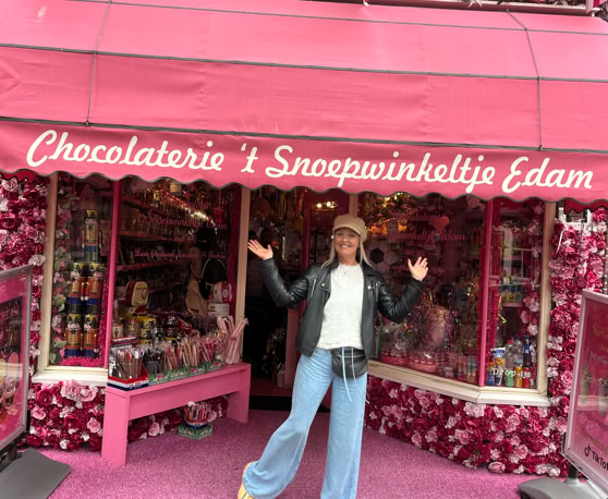 Maaike your local tourguide  wearing Dutch wooden shoes. Windmill, Tulips, Cheese, Zaanse Schans, Keukenhof, Volendam, Marken, Alkmaar.
