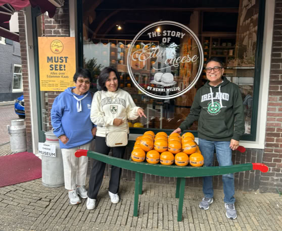 Maaike your local tourguide  wearing Dutch wooden shoes. Windmill, Tulips, Cheese, Zaanse Schans, Keukenhof, Volendam, Marken, Alkmaar.